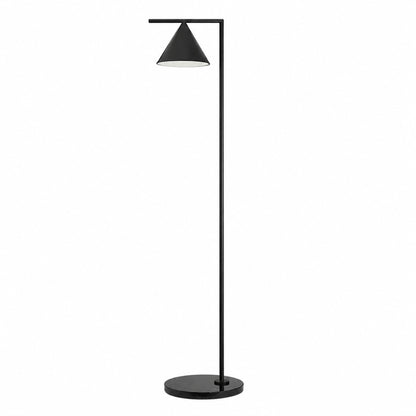 Girevole marble floor lamp with a spinning cone shade on a Carrara marble base glowing warm in a living room corner