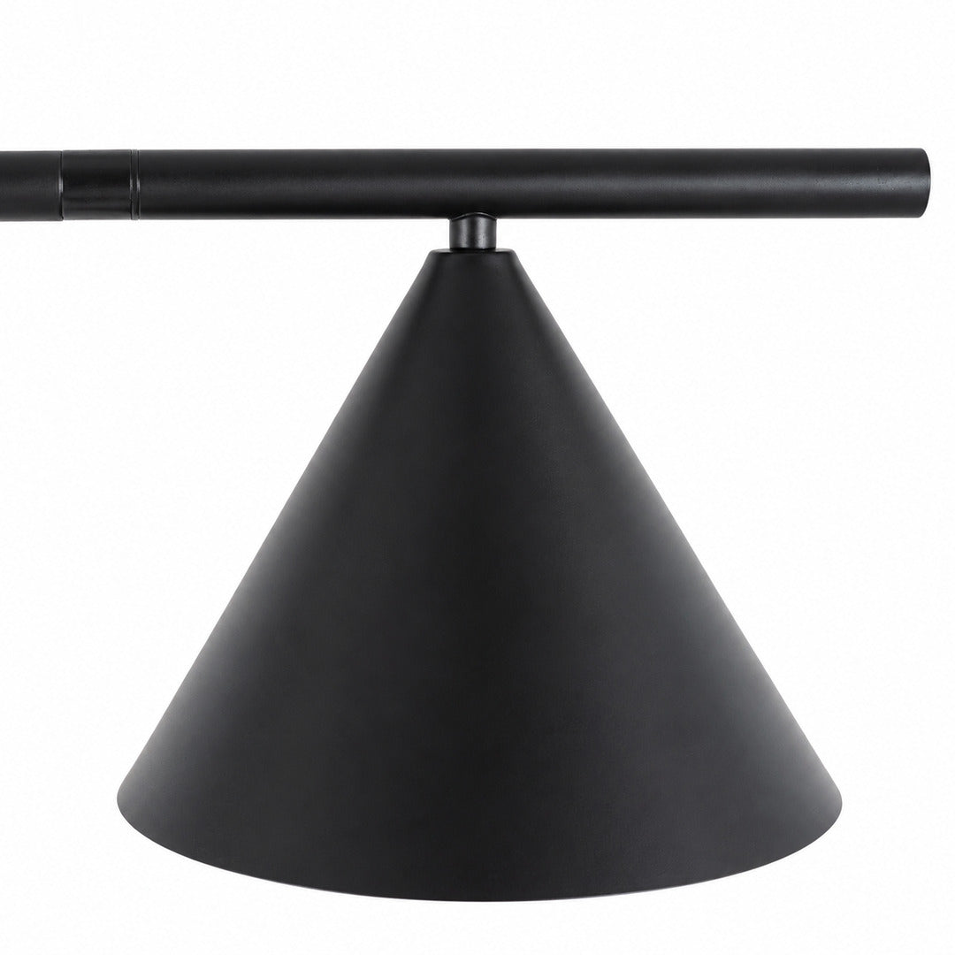 Close-up of the spinning opal cone shade on the Girevole floor lamp rotating to direct light
