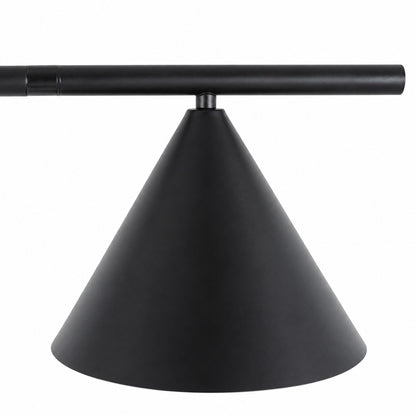 Close-up of the spinning opal cone shade on the Girevole floor lamp rotating to direct light