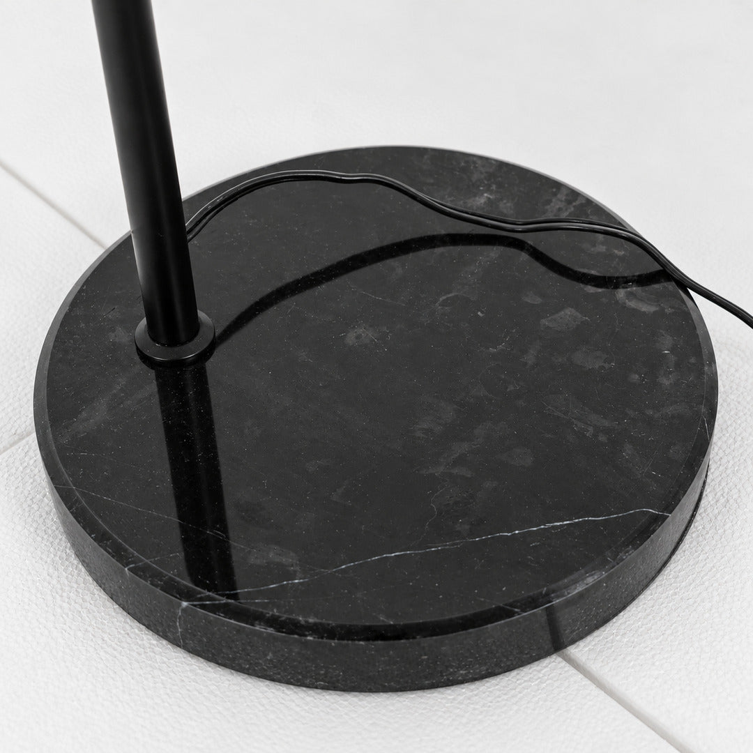 Detail of the genuine white Carrara marble base of the Girevole floor lamp, unique veining on each