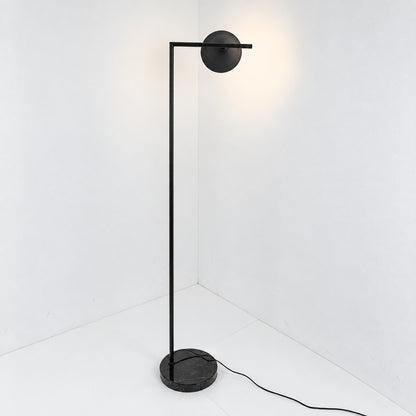 Close-up of the spinning opal cone shade on the Girevole floor lamp rotating to direct light