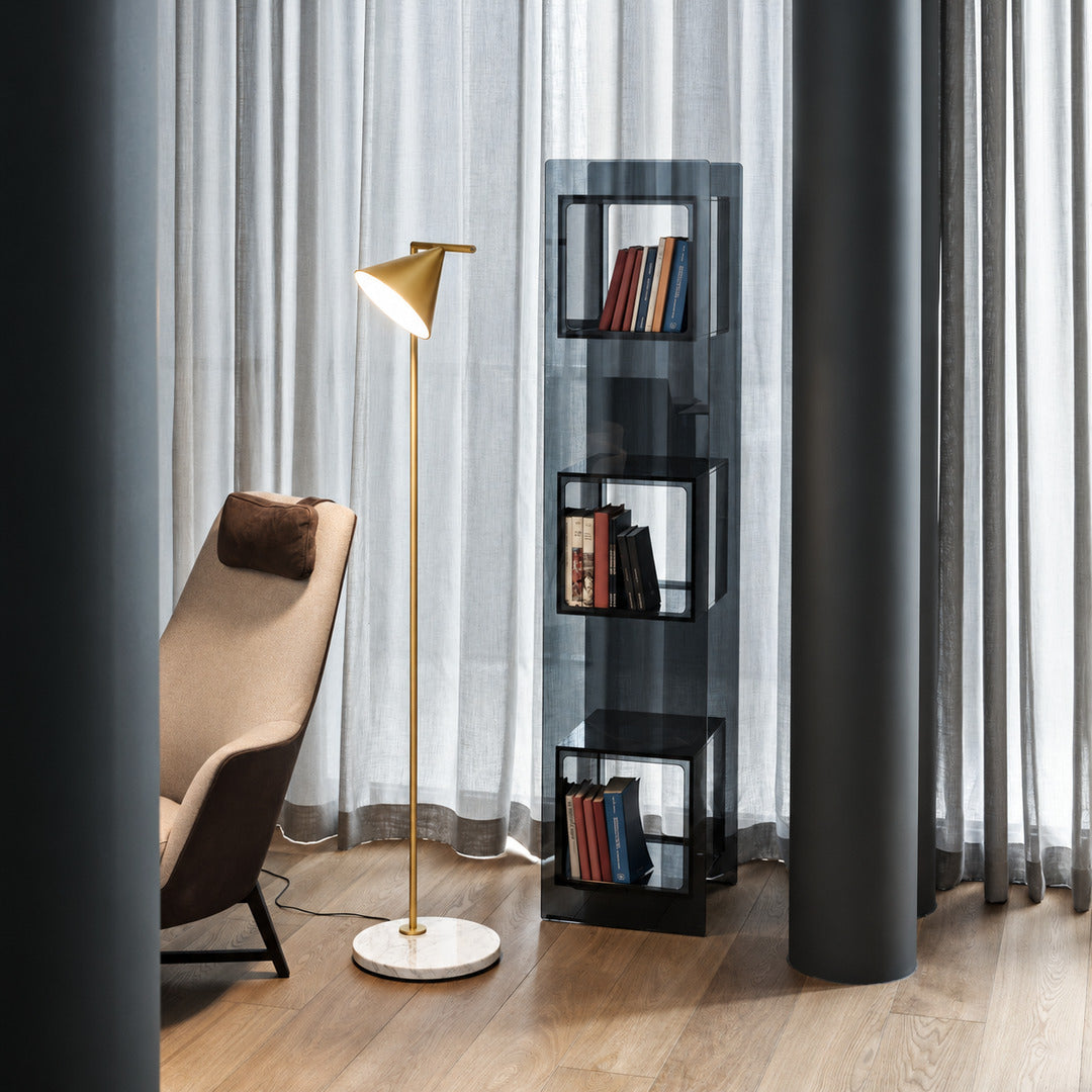 Girevole marble floor lamp angled to direct task light over a home office desk