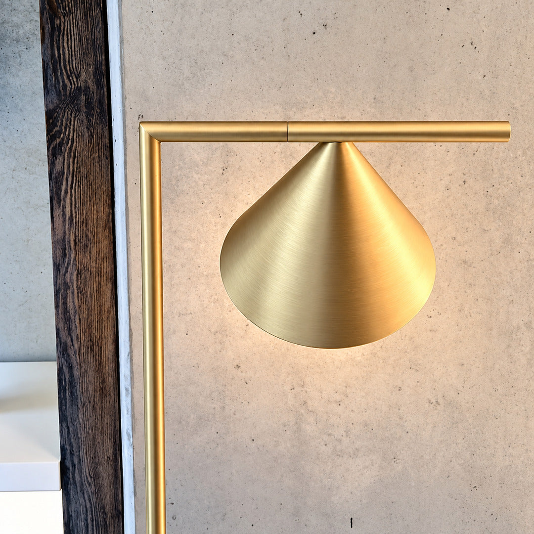 Close-up of the spinning opal cone shade on the Girevole floor lamp rotating to direct light