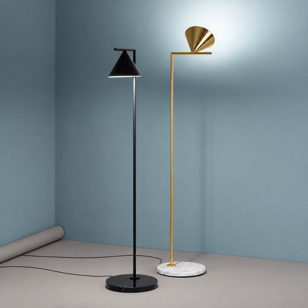 Copper and black finish options of the Girevole marble floor lamp shown side by side