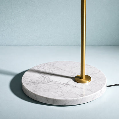 Detail of the genuine white Carrara marble base of the Girevole floor lamp, unique veining on each