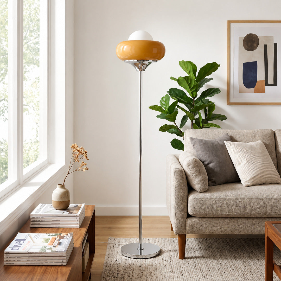 Caramella floor lamp living room beside sofa warm caramel glow glass globe chrome retro vintage modern cozy American home lifestyle interior styled