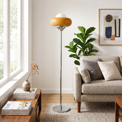 Caramella floor lamp living room beside sofa warm caramel glow glass globe chrome retro vintage modern cozy American home lifestyle interior styled