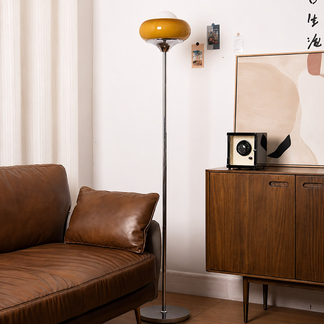 Caramella floor lamp living room beside sofa warm caramel glow glass globe chrome retro vintage modern cozy American home lifestyle interior styled