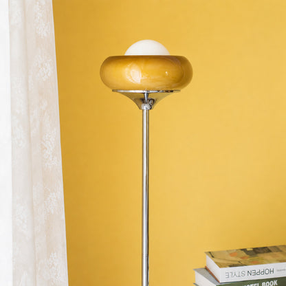 Caramella floor lamp illuminated evening retro warm caramel amber glowing glass globe chrome moody cozy American home lifestyle interior