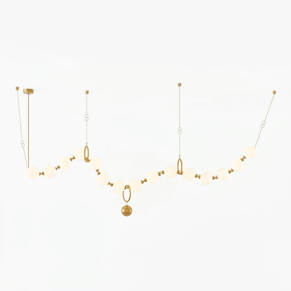 Cascadia linear horizontal chandelier 15-light brass arc pearl globes white background