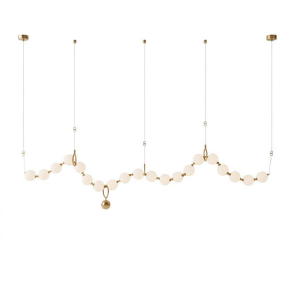 Cascadia linear horizontal chandelier 20-light brass arc pearl globes white background