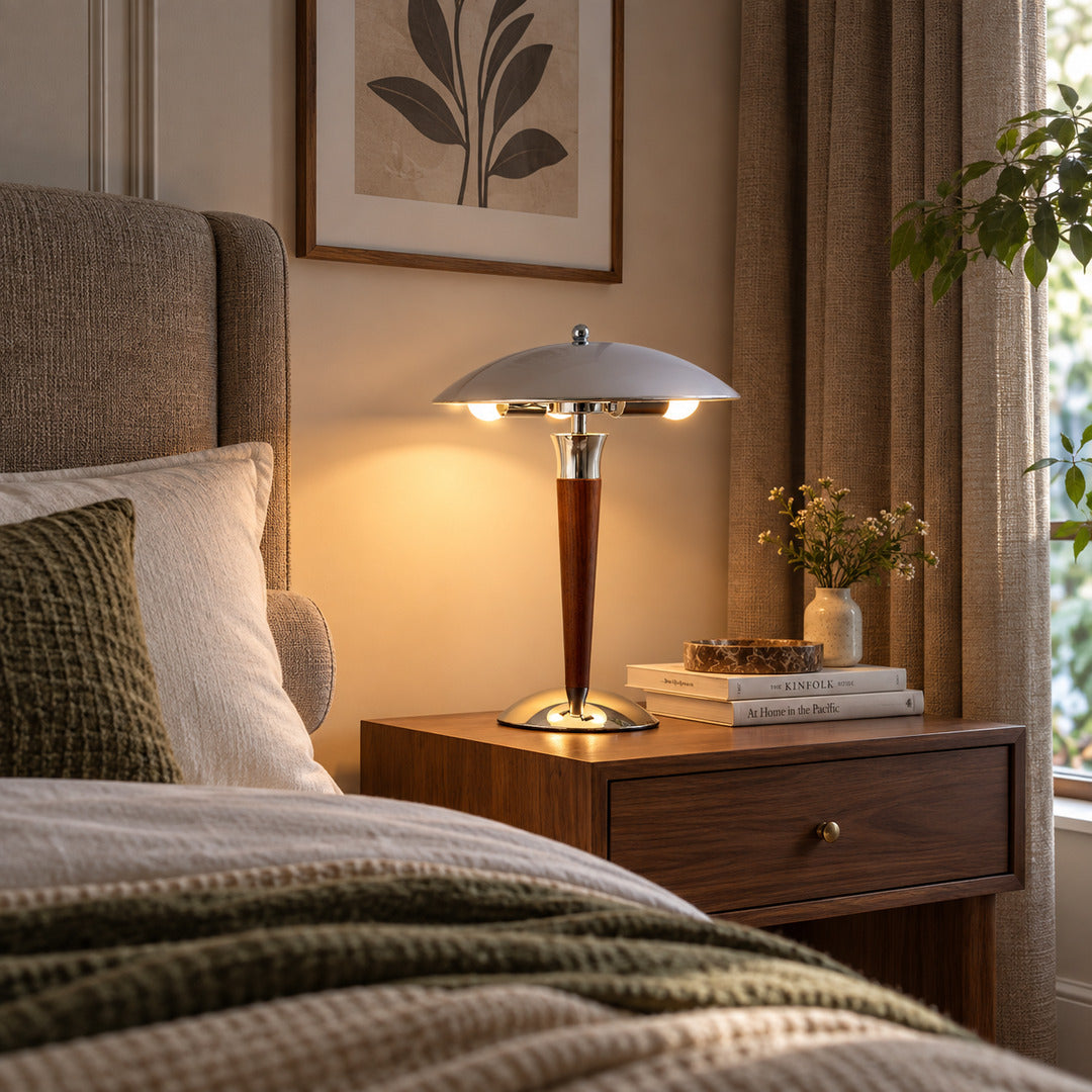Casco table lamp on a nightstand casting a warm downward glow for bedside reading