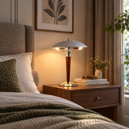 Casco table lamp on a nightstand casting a warm downward glow for bedside reading