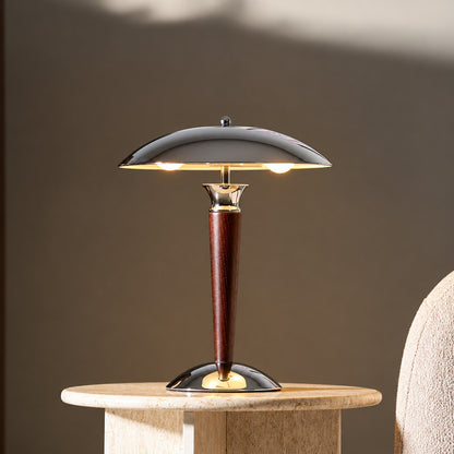 Casco chrome and walnut table lamp as a modern accent on a living room side table