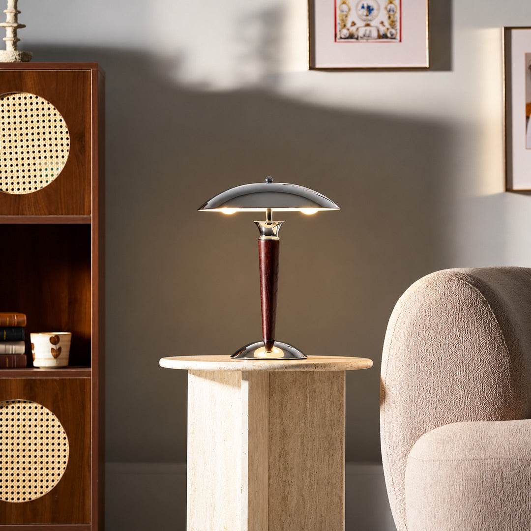 Casco chrome and walnut table lamp as a modern accent on a living room side table