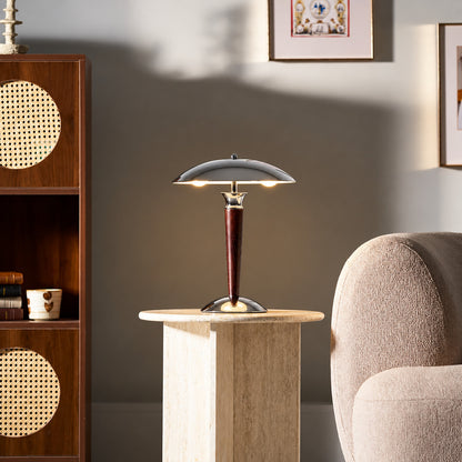 Casco chrome and walnut table lamp as a modern accent on a living room side table