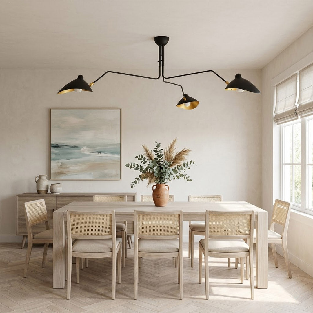 Cassio 3 light multi arm chandelier above modern dining room rectangular table mid century matte black architectural statement