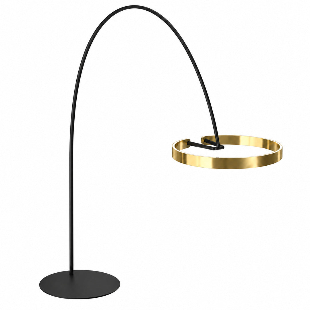 Cerchio floor lamp with a floating halo ring of warm LED light on a slim stem in a modern living room