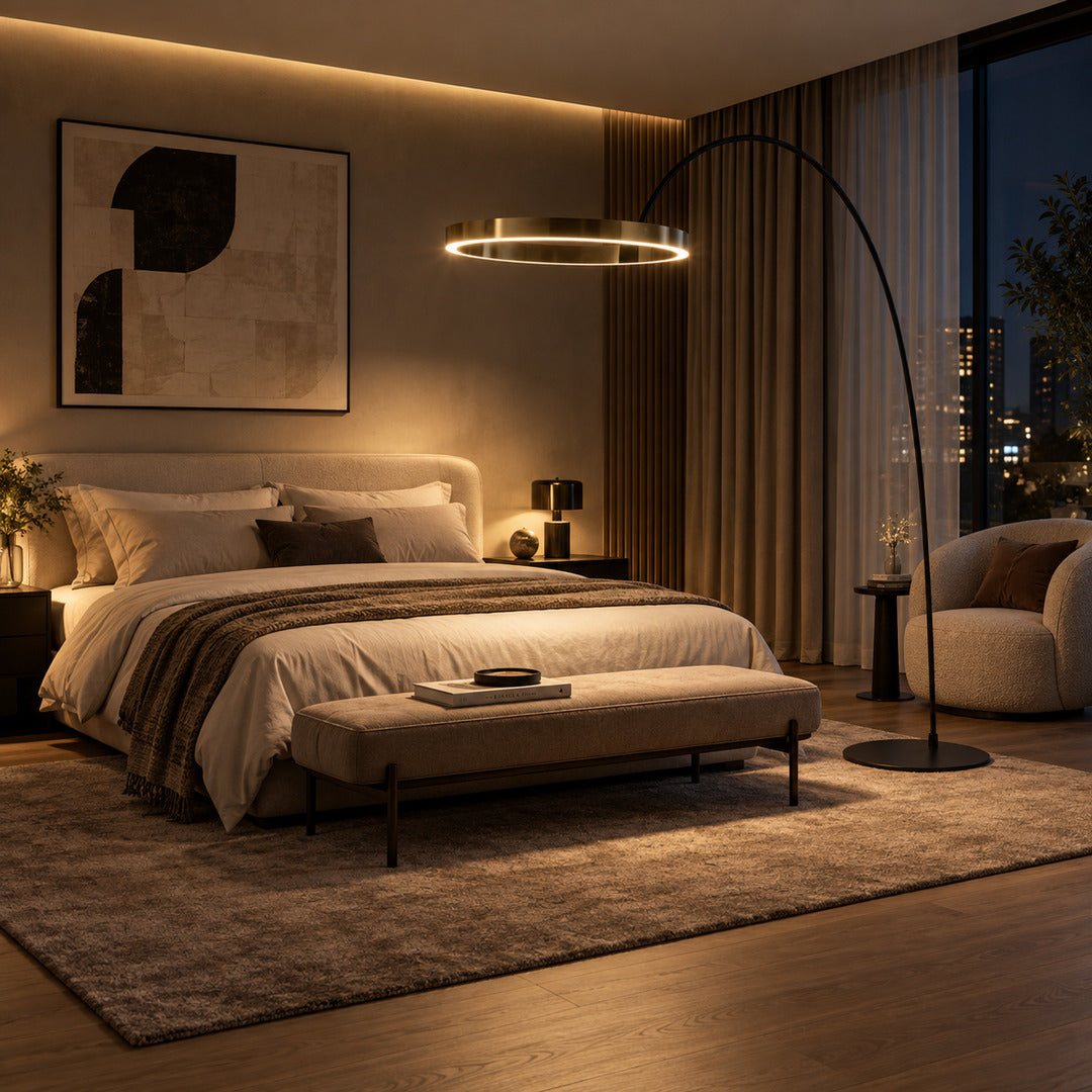 Cerchio halo ring floor lamp adding a warm modern accent beside a master bedroom bed