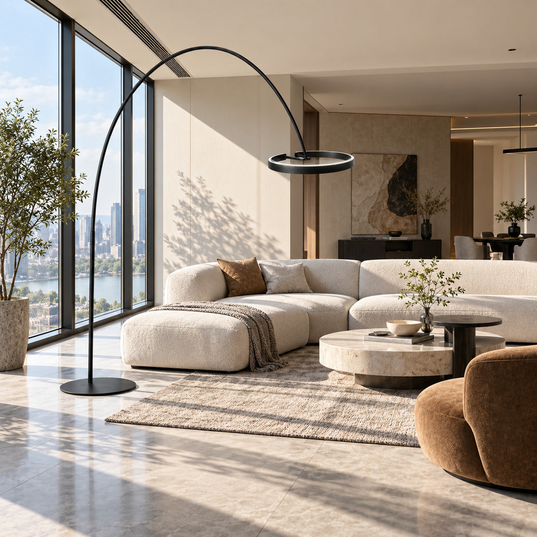 Cerchio halo ring floor lamp standing beside a sofa as a modern sculptural accent in a living room