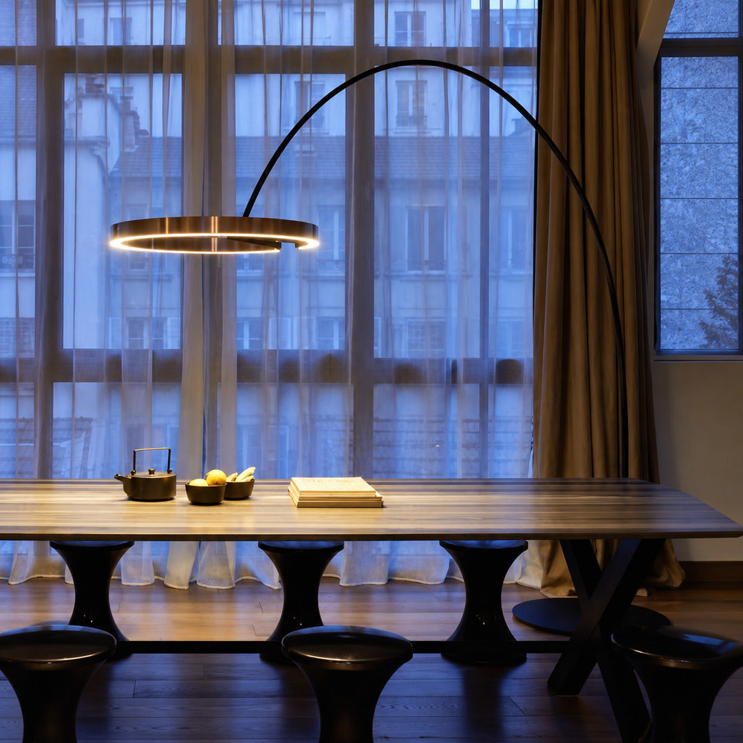 Black Cerchio halo ring floor lamp complementing a clean modern minimalist living room