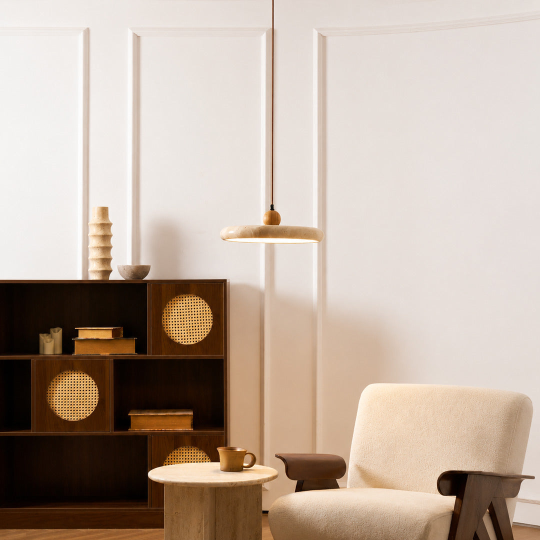 Cerchio travertine pendant light breakfast nook warm glow travertine stone disc American home lifestyle interior styled