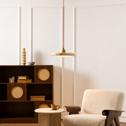 Cerchio travertine pendant light breakfast nook warm glow travertine stone disc American home lifestyle interior styled