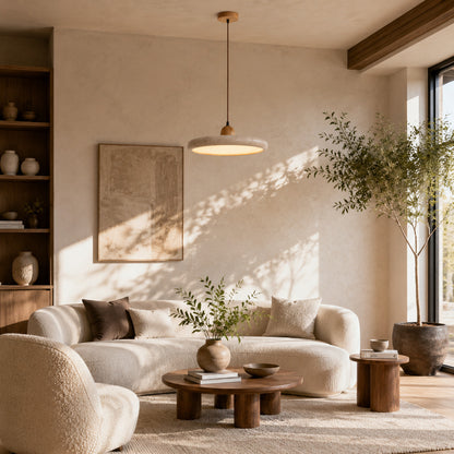 Cerchio travertine pendant light living room warm glow travertine stone disc sculptural American home lifestyle interior styled