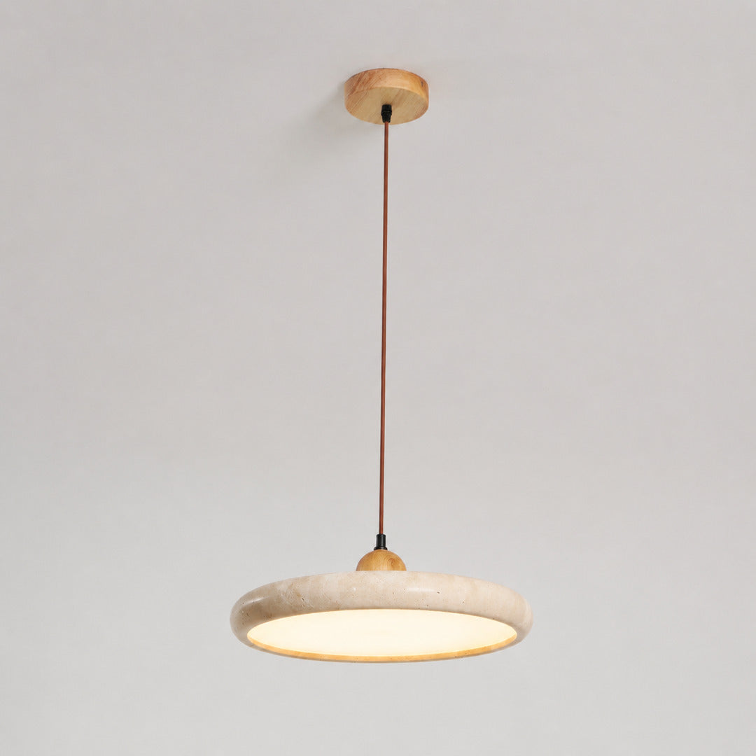 Cerchio travertine pendant light illuminated warm integrated LED glow travertine stone disc white background