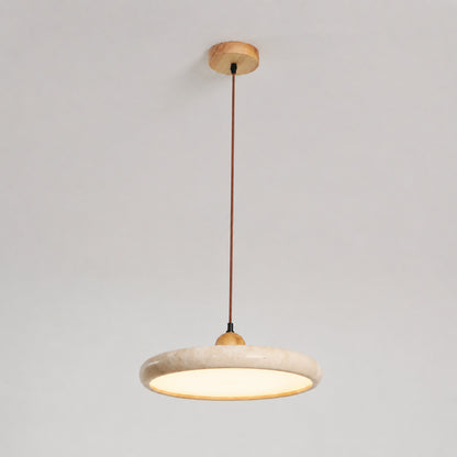 Cerchio travertine pendant light illuminated warm integrated LED glow travertine stone disc white background