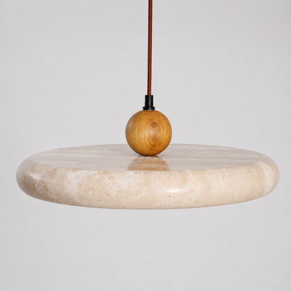 Cerchio travertine pendant light yellow travertine natural stone veining porous texture disc detail close up unique