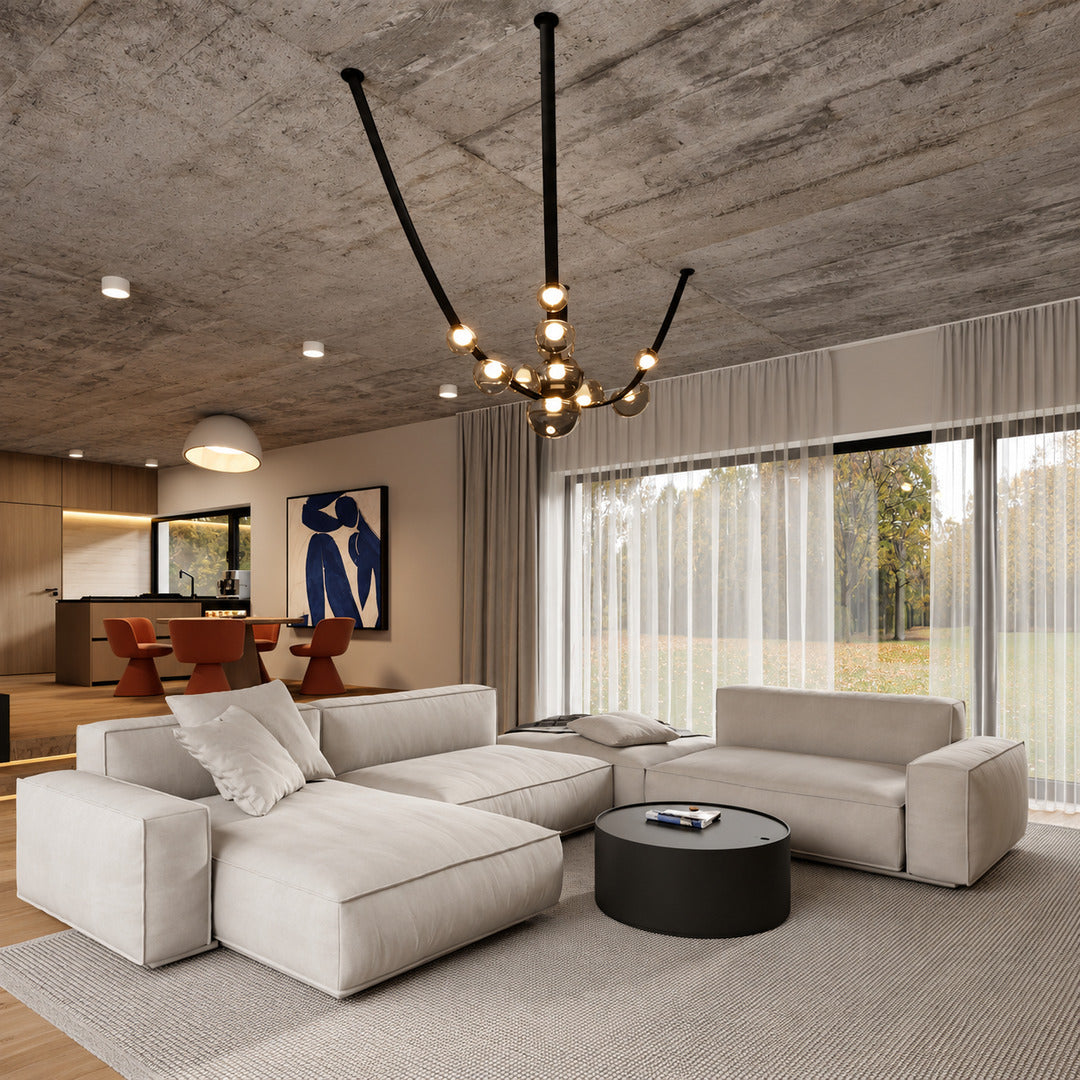 Cinghia leather arc chandelier as a linear statement piece in a modern living room