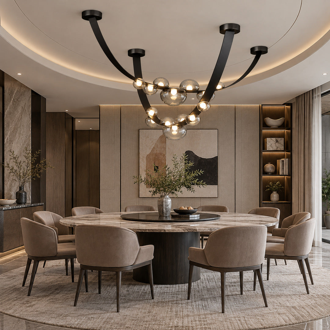 Cinghia leather arc chandelier casting a warm glow over a long dining table
