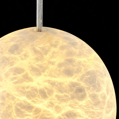 Natural veining and translucency of the alabaster shade on the Ciotola pendant, unique to each piece