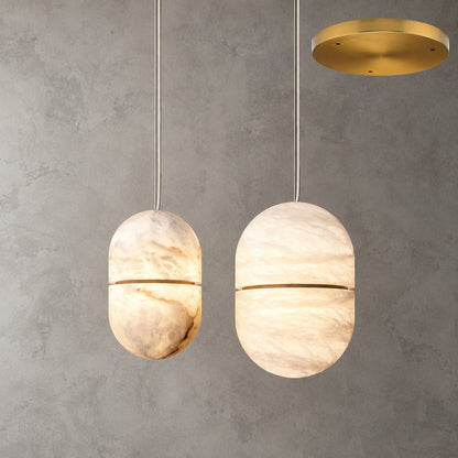 Two-light Ciotola alabaster pendant with staggered stone bowls over a kitchen island