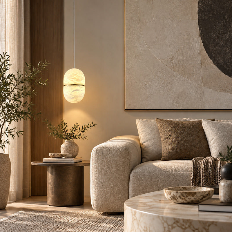 Ciotola alabaster pendant as a warm sculptural accent in a modern living room