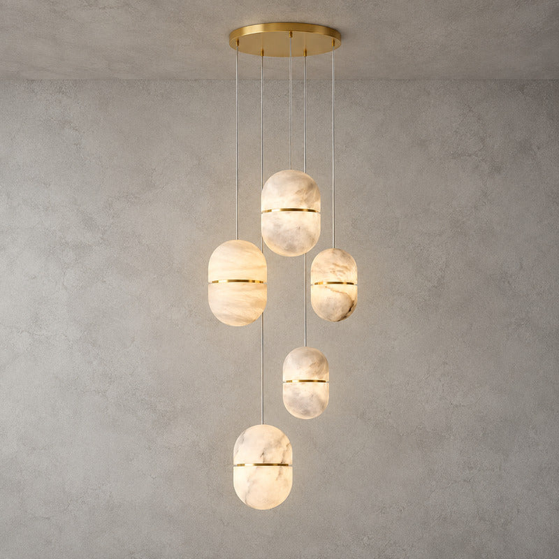 Five-light Ciotola alabaster pendant cascading down an open staircase stairwell