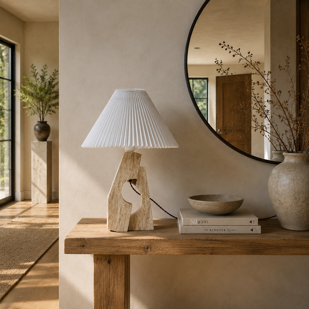 Colonna travertine table lamp entryway console warm glow travertine stone fabric sculptural American home lifestyle interior styled