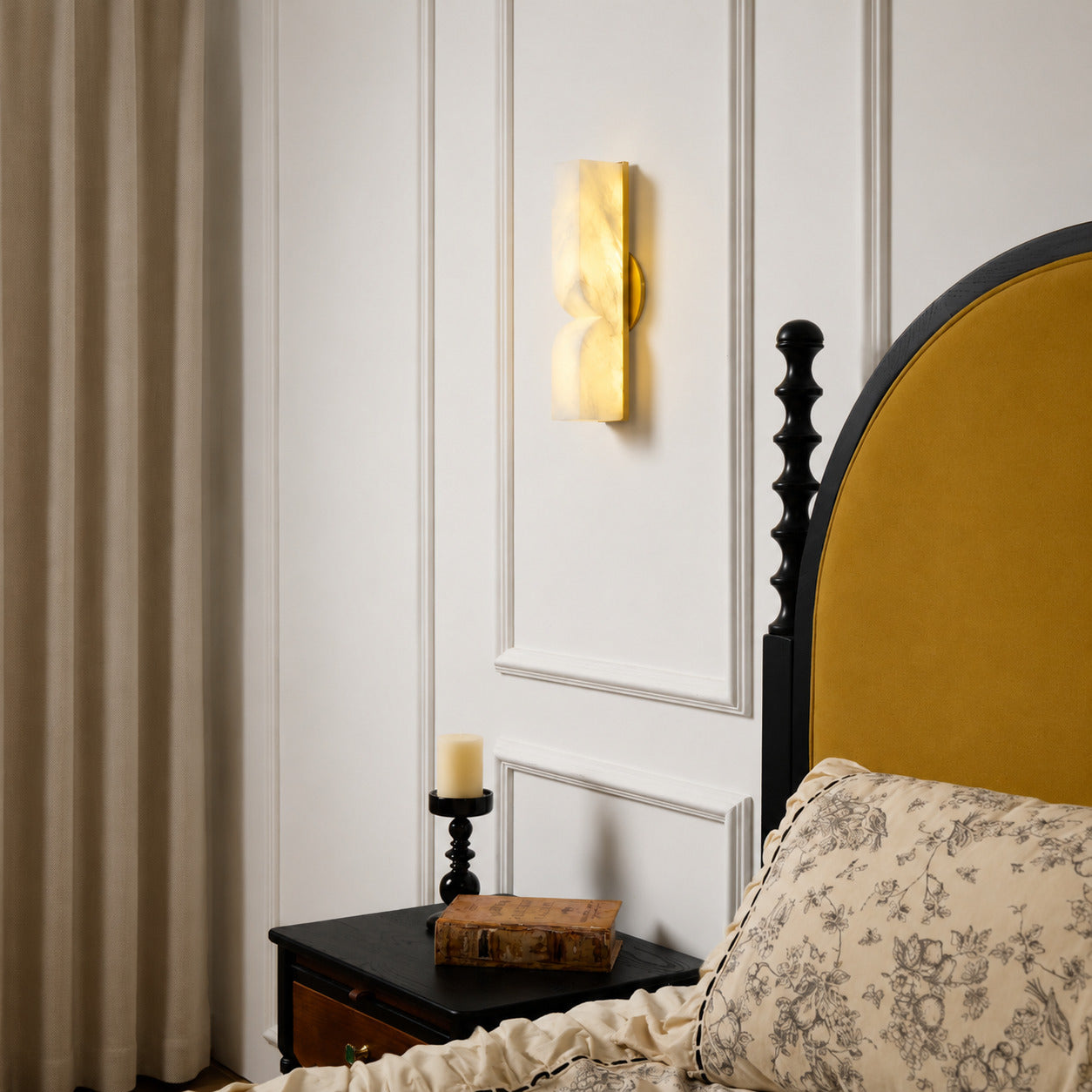Contatto alabaster wall sconce bedroom bedside carved natural stone warm glow quiet luxury American home lifestyle interior styled