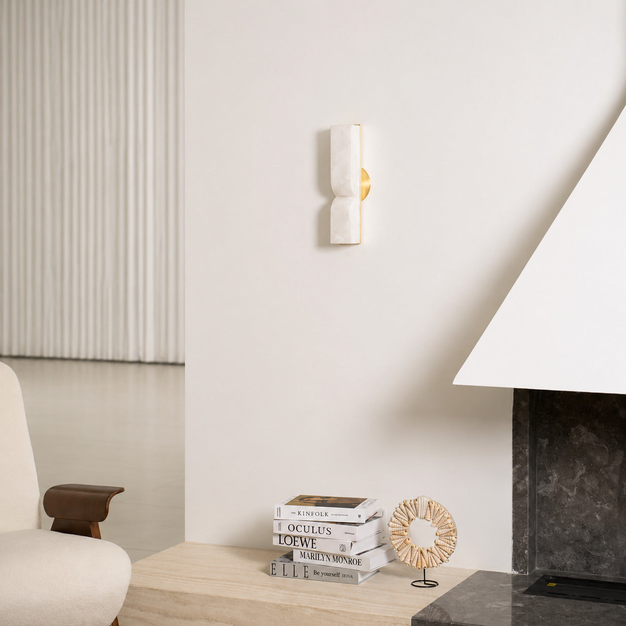 Contatto alabaster wall sconce living room wall carved natural stone statement quiet luxury American home lifestyle interior styled
