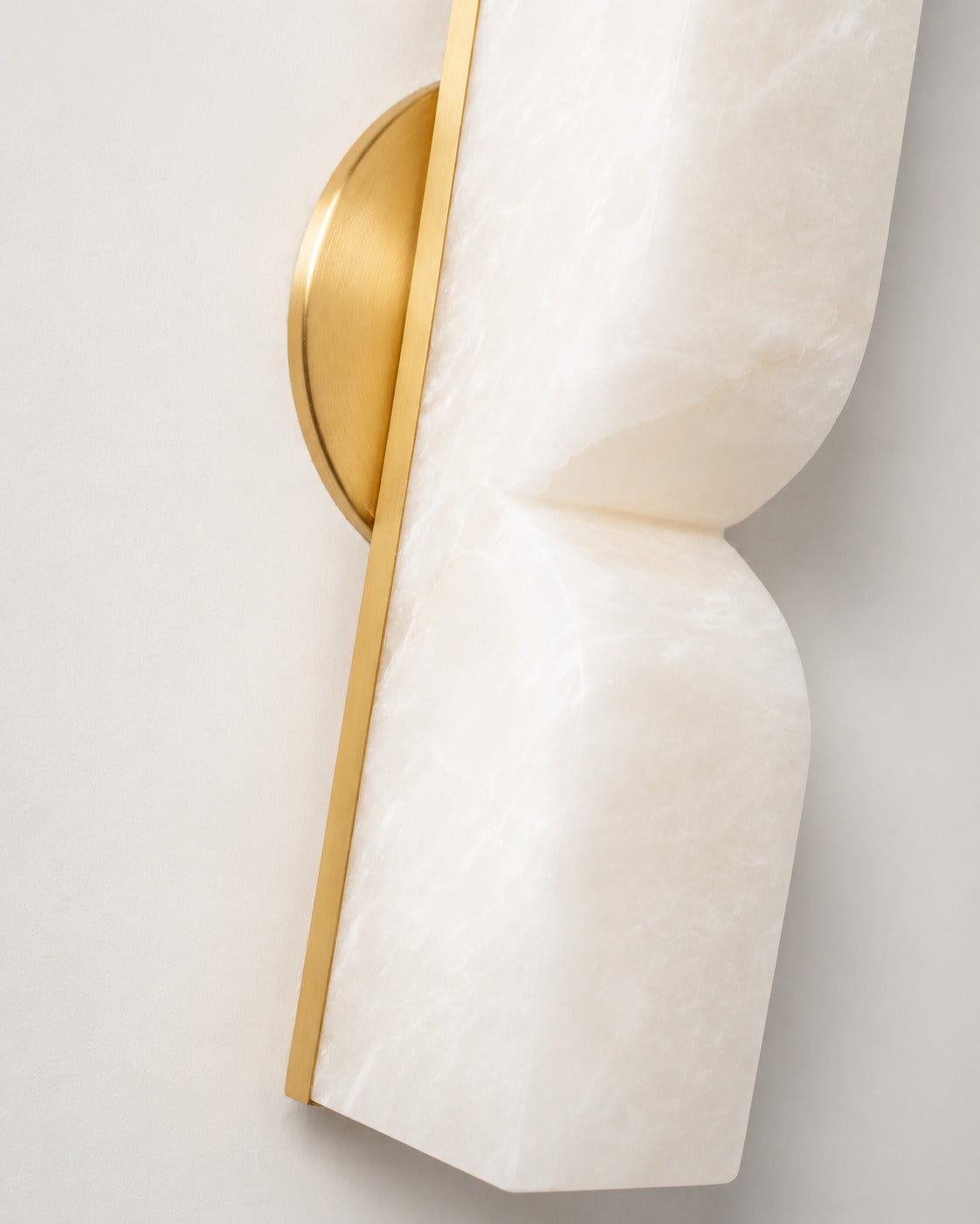 Contatto alabaster wall sconce gold metal finish trim hardware detail close up refined luxurious
