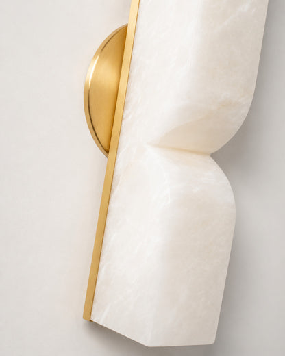 Contatto alabaster wall sconce gold metal finish trim hardware detail close up refined luxurious