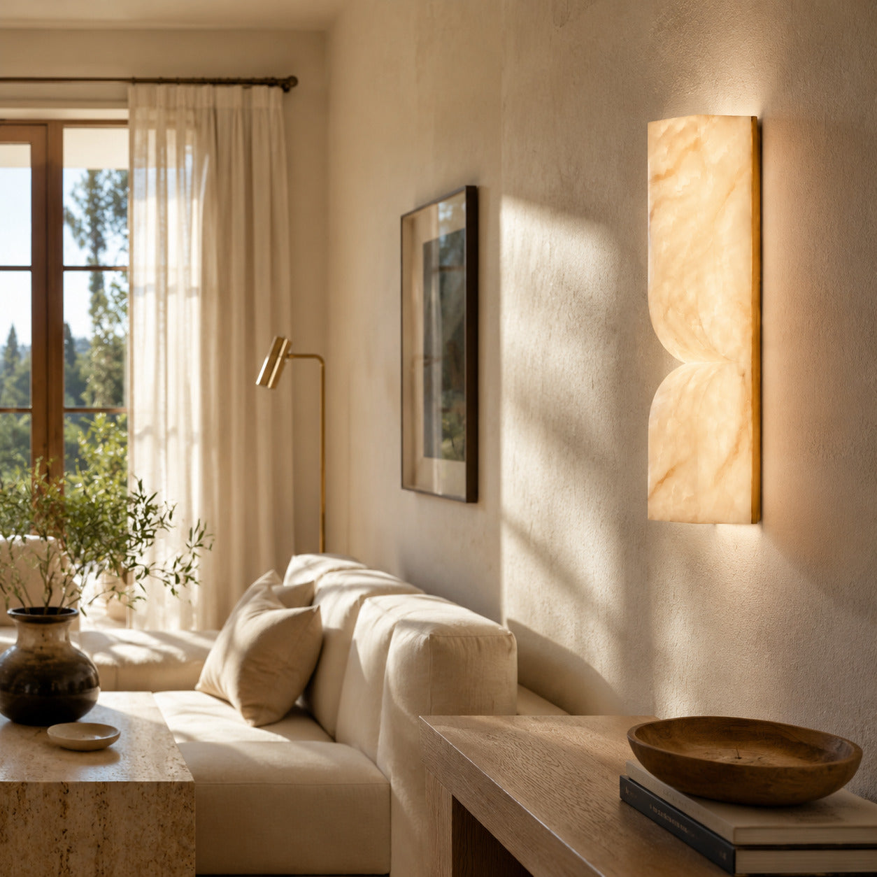 Contatto alabaster wall sconce living room wall carved natural stone statement quiet luxury American home lifestyle interior styled