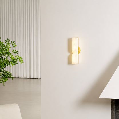 Contatto alabaster wall sconce living room wall carved natural stone statement quiet luxury American home lifestyle interior styled