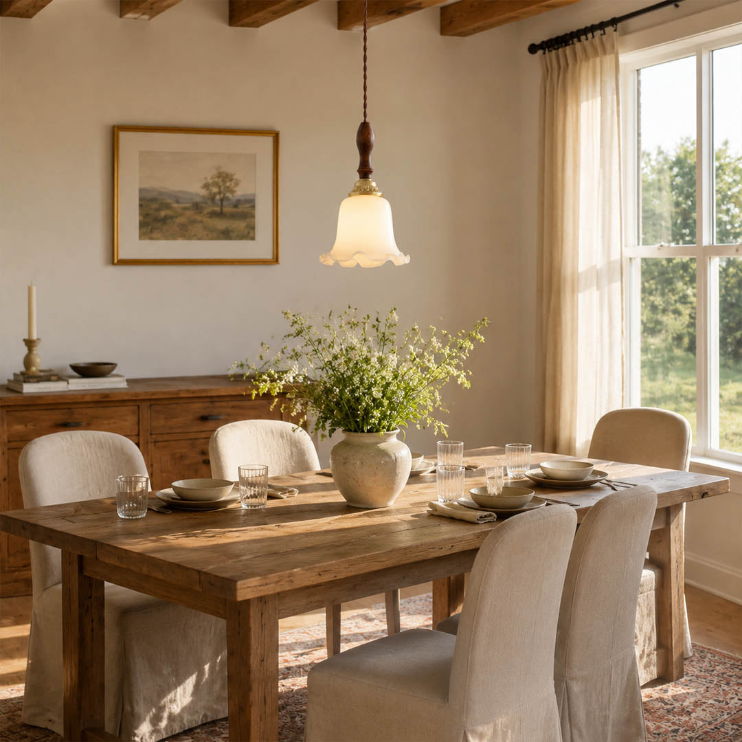 Cora Mini pendant cluster above long rectangular dining table modern open plan dining warm milky brass wood interior