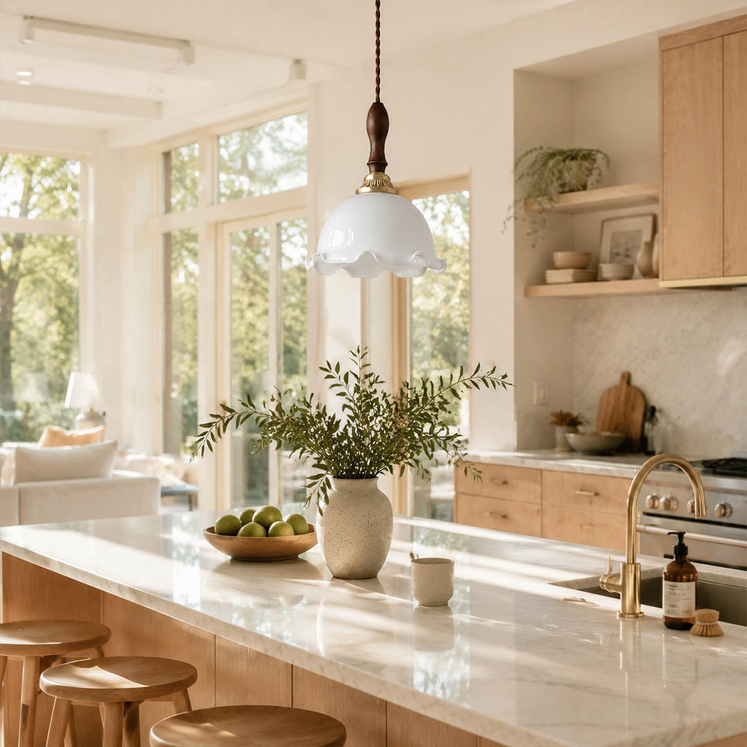 Cora Mini pendant cluster above long rectangular dining table modern open plan dining warm milky brass wood interior