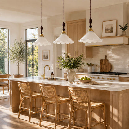 Cora Mini pendant cluster above long rectangular dining table modern open plan dining warm milky brass wood interior