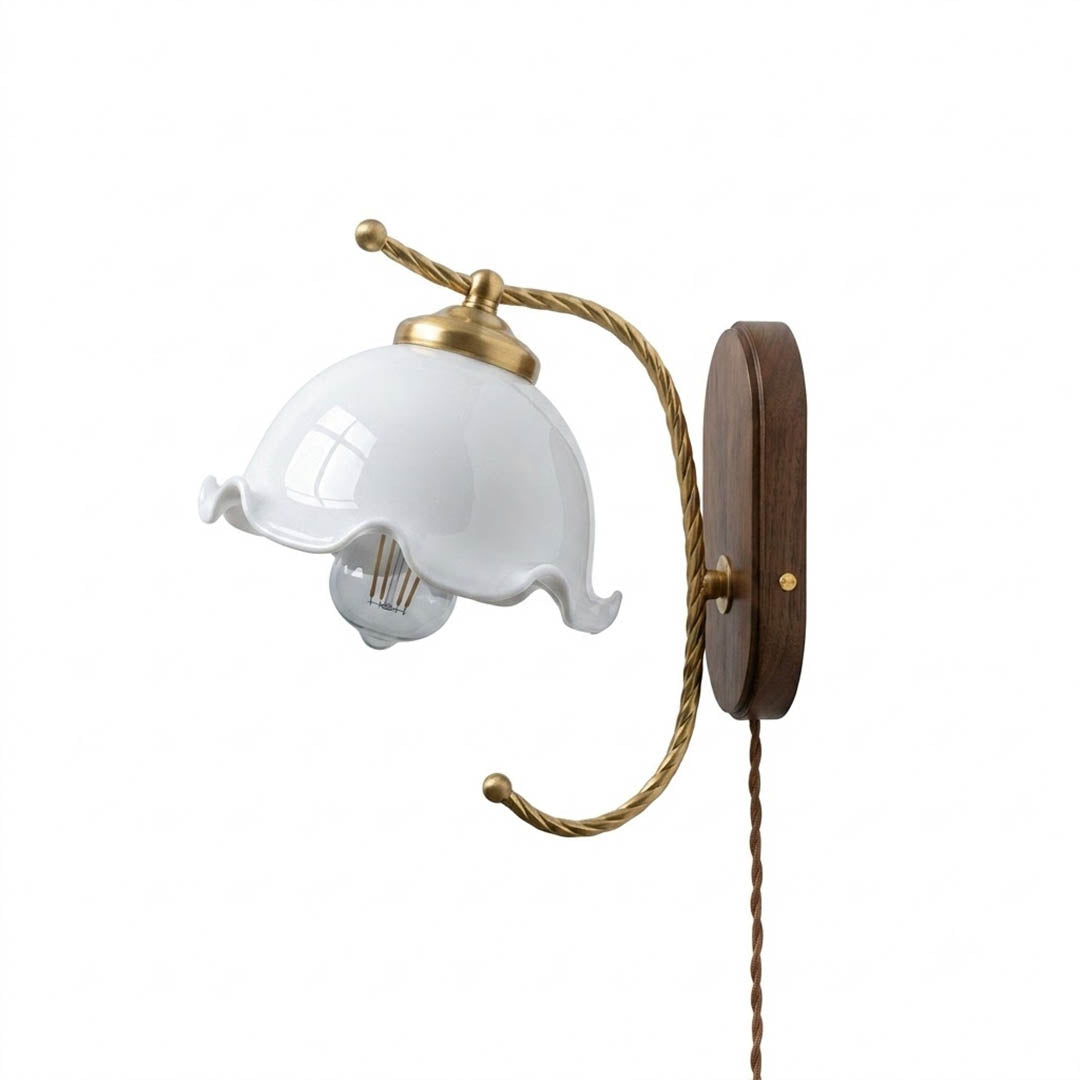 Cora plug in wall sconce milky white flower glass shade wood mount brass collar 5.9 inch hand blown white background