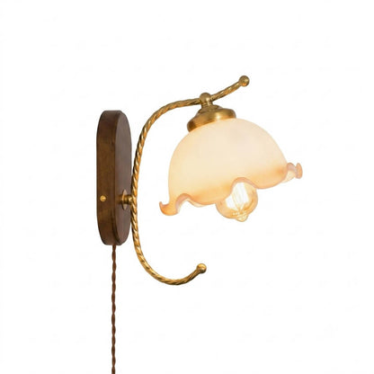 Cora plug in wall sconce milky white flower glass shade wood mount brass collar 5.9 inch hand blown white background