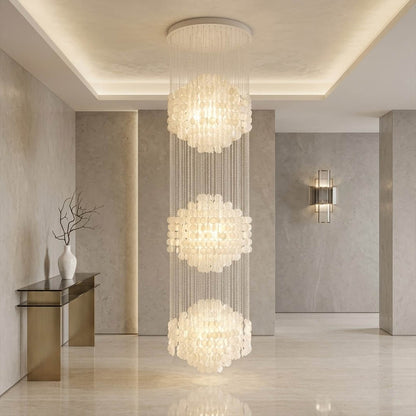 Coralia 3DM FUN tall style staircase shell chandelier two story staircase 9 5 feet tall spiral mansion oceanfront grand entrance vertical statement Mid Century designer warm glow lifestyle interior